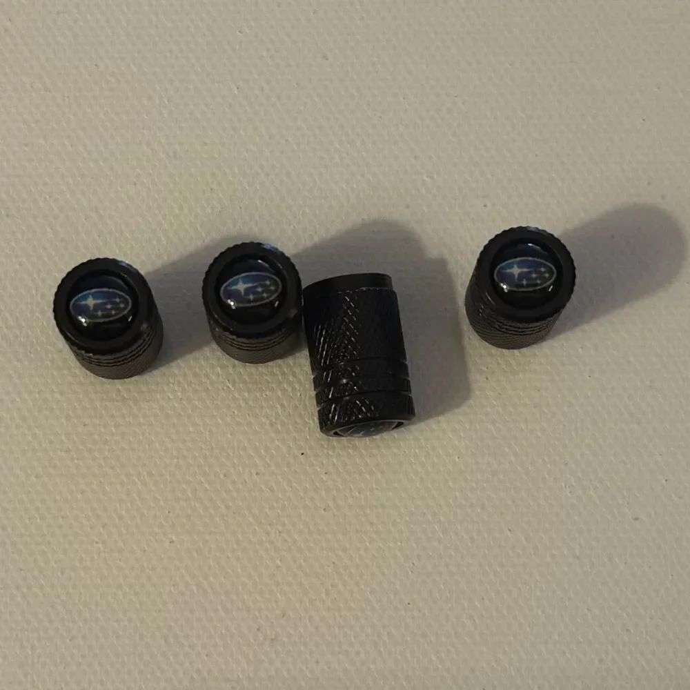 Subaru Valve Stem Caps in Black Set of 4 NWT